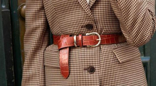 Woman Wearing Belt Over a Plaid Jacket
