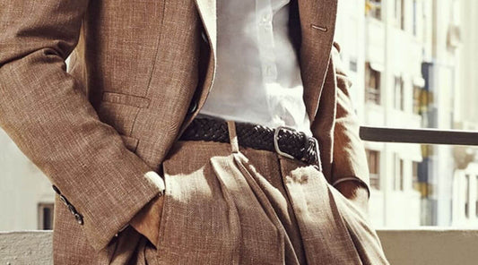 Image of A Male In Brown Suit and A Brown Braided Belt  
