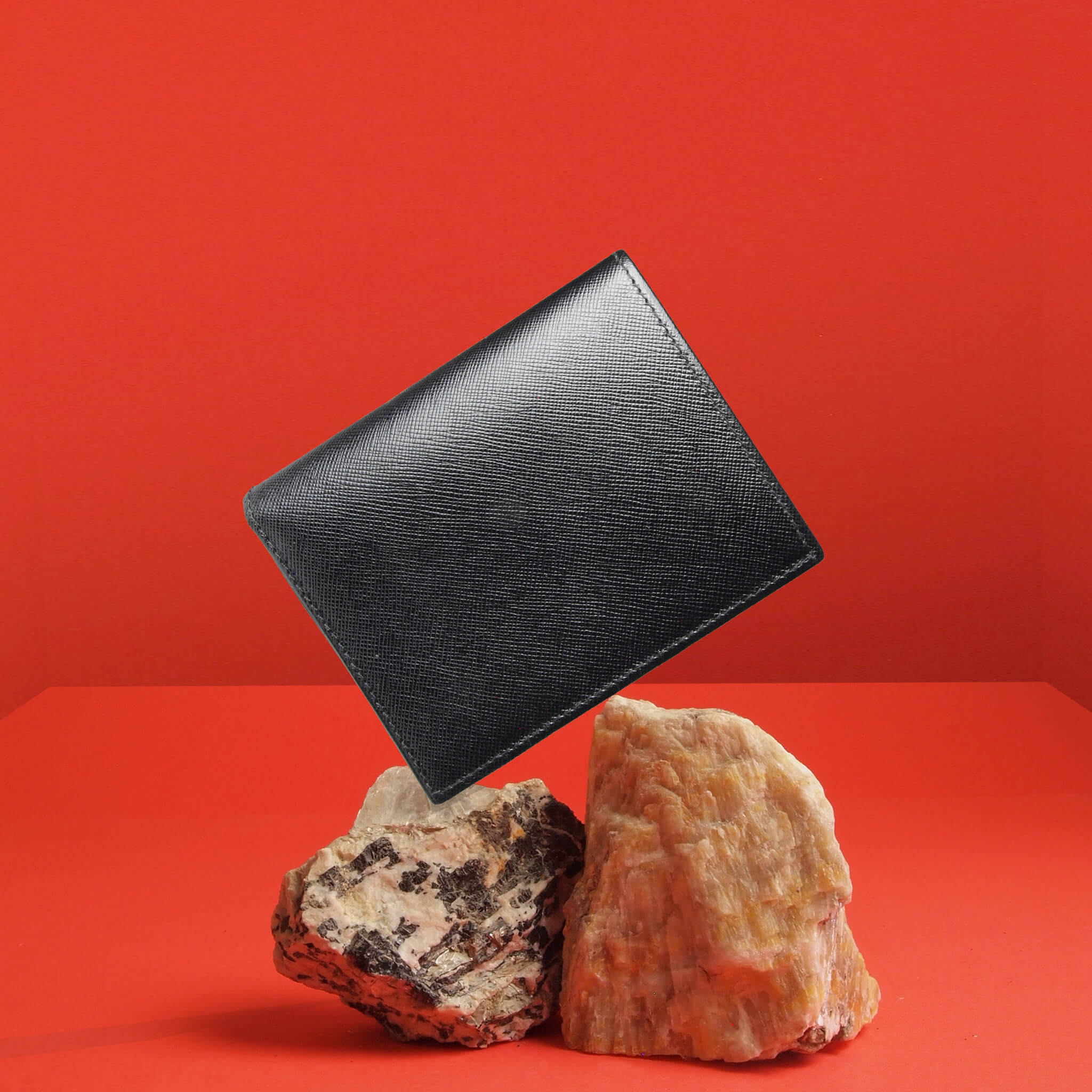 72 Smalldive Saffiano Leather Wallet Balanced on Rock